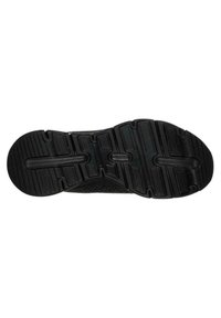 Suela de zapato deportivo negro con diseño de banda de rodadura robusta, que presenta profundos surcos y elementos de amortiguación para tracción y soporte.