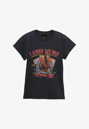 Black T-shirt with "LAINEY WILSON" text, a galloping horse, horseshoe, playing cards, and roses graphic on the front.