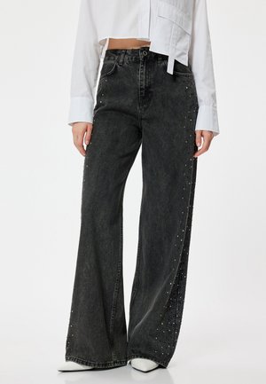 WIDE LEG - Leveälahkeiset - black