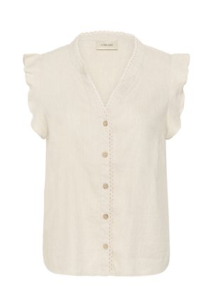 Bluza cu mâneci scurte, de culoare crem, cu mâneci cu volane, nasturi în față și margine delicată din dantelă de-a lungul decolteului și a fantei cu nasturi.