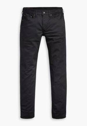 Zwarte slim-fit jeans met voorzakken, riemlussen en een knoopsluiting, plat weergegeven tegen een witte achtergrond.