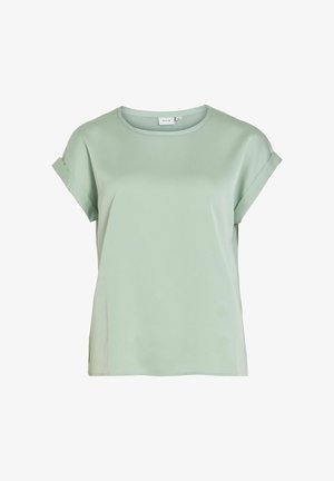Blusa verde-claro de manga curta feita de tecido suave. Decote redondo, mangas enroladas e um ajuste descontraído. Design minimalista sem padrões.