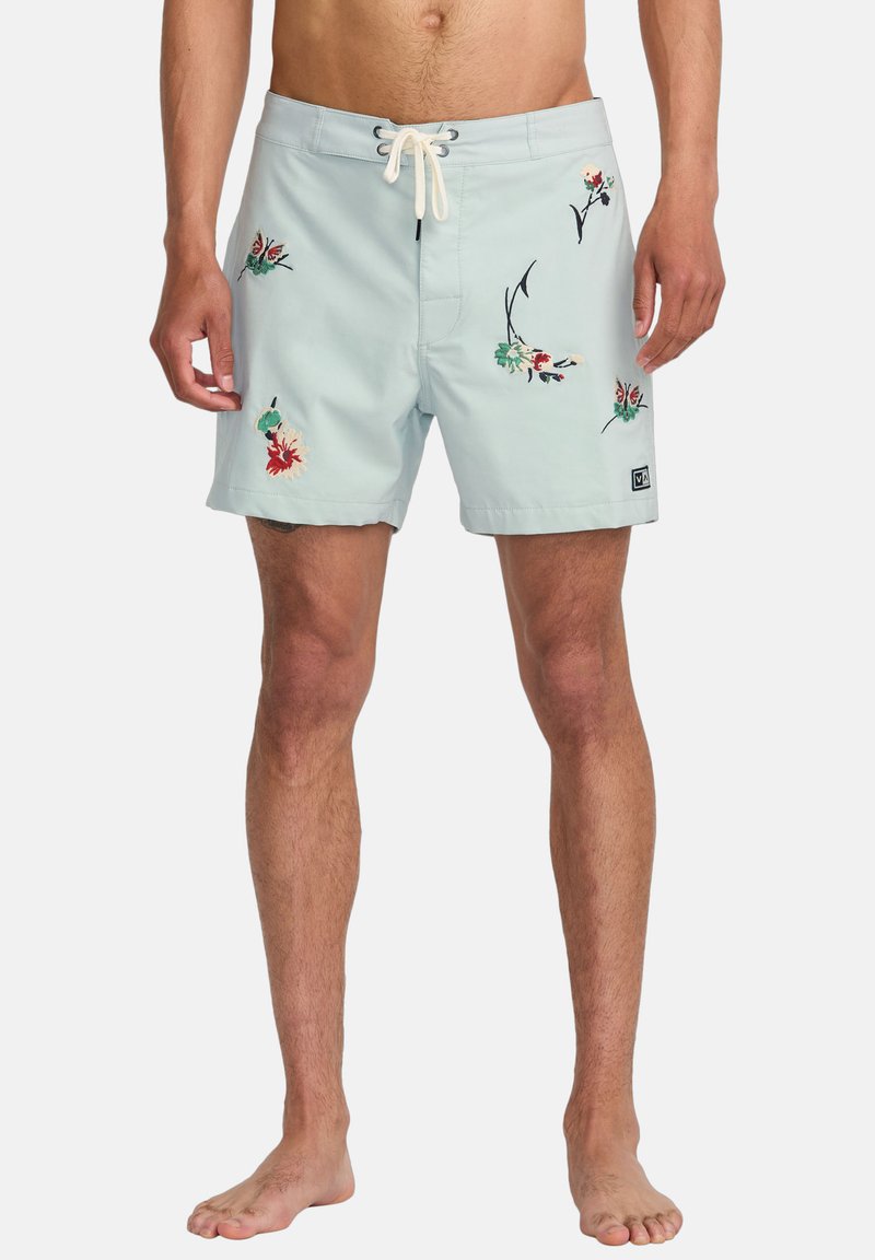 Light blue swim shorts featuring floral embroidery in red, green, and black. Elastic waistband with drawstrings; knee-length fit.