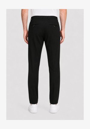 Zuitable, DISPARTAFLEX - Pantalones chinos - black