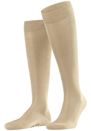 Tiago - Kniekousen - country