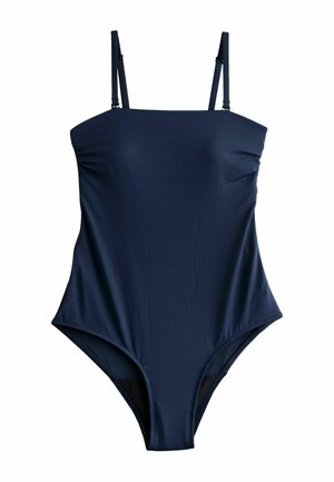 Maillot de bain une pièce bleu marine avec bretelles fines, texture lisse, jambes échancrées et design élégant, fabriqué en tissu de bain extensible.