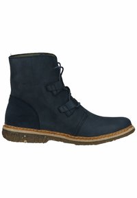 Navy blue ankle boot made of textured leather, featuring two straps with buckles, a rounded toe, and a rubber sole with a stitched edge.