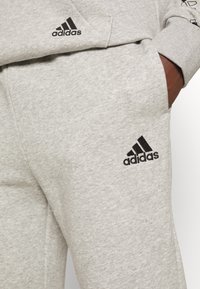 adidas Sportswear Träningsbyxor - grey