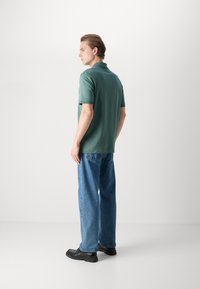 BOSS Bluză polo - open green
