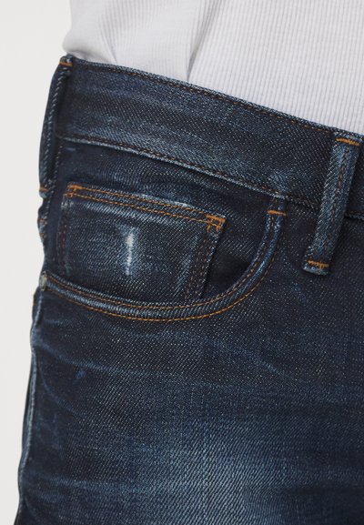 Emporio Armani Karcsúsított farmerek - denim blu