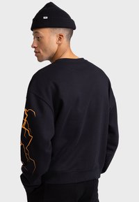 Redefined Rebel CEDDIE UNISEX - Sweatshirt - black