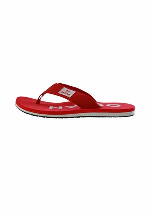 Red flip-flop sandal with white "OCEAN" text on the sole, red fabric straps, and a small label with a bird logo on the side.