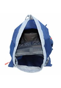 Sac à dos bleu marine avec un cordon de serrage, doté d'une doublure intérieure grise, de bretelles ajustables et d'une poche avant avec un séparateur en maille.