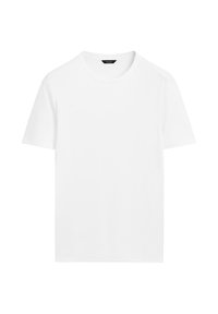 Hvid bomulds t-shirt med rund hals, korte ærmer og lige skæring. Har en glat, let tekstur og ingen synlige mønstre.