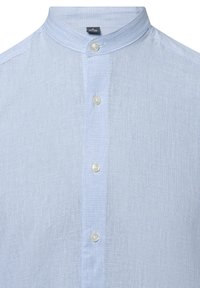 Light blue checkered shirt with a stand-up collar, featuring a button closure and textured fabric. Buttons are round and white.