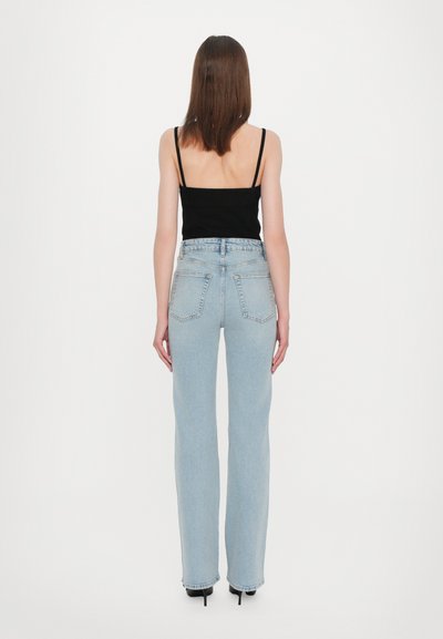 FRAME THE ARROW - Flared Jeans - blue