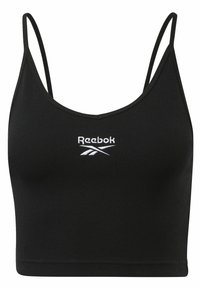 Fekete bordázott cropped top vékony pántokkal és V-kivágással, elöl fehér "Reebok" logó hímzéssel. Az anyag sima tapintású.