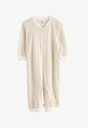 Une combinaison rayée en tissu doux, dotée d'une fermeture éclair à l'avant, de manches courtes et de poignets retroussés dans des couleurs crème et beige clair.