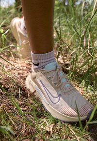 Nike Performance Chaussures de running - beige