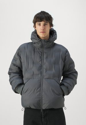 Gray puffer jacket with a hood, featuring a quilted design, elastic cuffs, front zipper, and logo accents throughout.