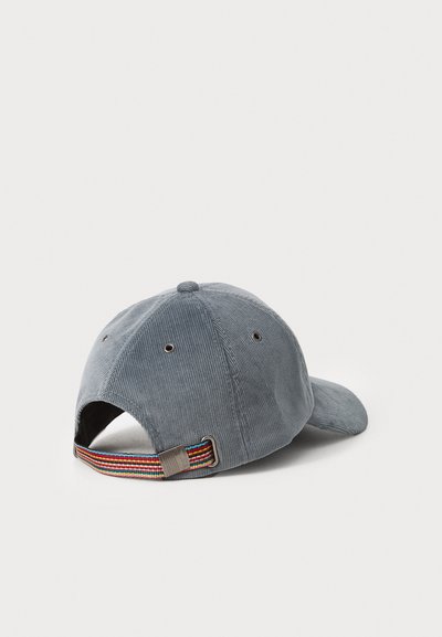 Kordfløyels baseball cap i lys grå med buet skjerm, justerbar flerfarget stripet stropp bak og ventilasjonsøyler.