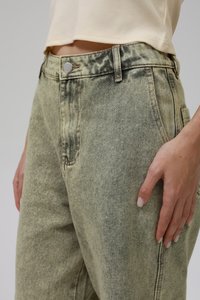 Light green denim jeans with a faded texture, five-pocket design, silver button closure, and visible stitching details.