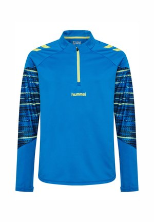 Maillot de sport à manches longues bleu avec col zippé mi-hauteur, présentant des accents bleus et jaunes à motifs sur les manches, et le logo "hummel" sur la poitrine.