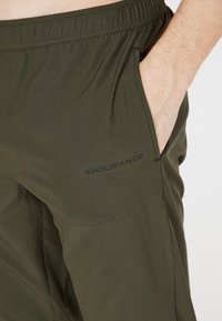 Endurance TIGHTS JEEN - Jogginghose - ivygreen