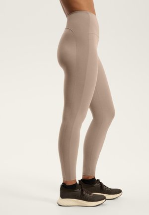 HIGH-RISE ANKLE-LENGTH - Leggingek - mottled beige