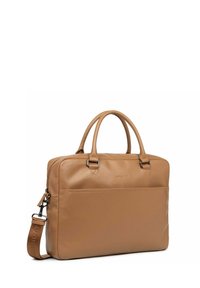 Tan leather laptop bag with dual top handles, removable shoulder strap, a zip closure, and a front pocket. Smooth texture with minimal accents.