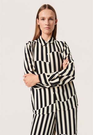 Skjortebluser - irregular stripes beige print