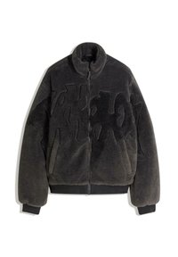 Faux fur black jacket with a high collar, zip closure, and quilted pattern detail on the front, featuring ribbed cuffs and hem.