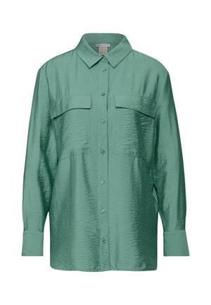Mintgroene, lange mouwen shirt met een satijnen afwerking, voorzien van een klassieke kraag, twee borstzakken en een knoopsluiting aan de voorkant.