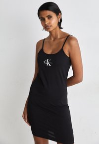 Calvin Klein Jeans - MONOLOGO STRAPPY DRESS - Robe en jersey - black Image miniature 1