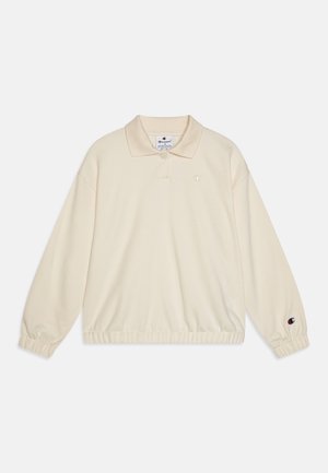 Kreemikaalune pullover, millel on kaelus, elastsed mansetid ja vöökoht. Rinnal ja varrukal on väike logo. Pehme tekstuur.