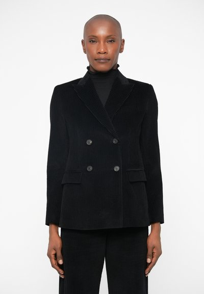 Black corduroy double-breasted blazer with a notched lapel, two front pockets, and button details. Smooth texture, tailored fit.