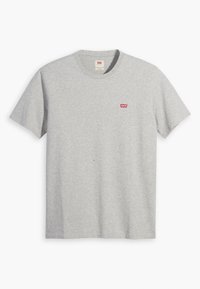 T-shirt in cotone grigio con collo a giro, maniche corte e un piccolo logo rosso di Levi's sul lato sinistro del petto. Tessuto liscio, vestibilità standard.