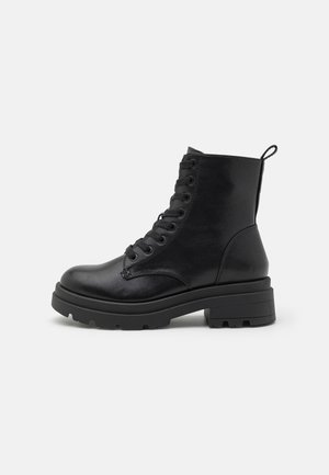 Platform ankle boots - black