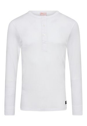 Hvid skjorte med lange ærmer, rund halsudskæring og knaplukning. Blødt bomuldsstof med et logo mærke i nederste venstre hjørne.
