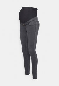 Jeans de maternidad grises con una cinturilla elástica negra, corte skinny y un cierre de botón en el lado frontal. Textura de denim suave.