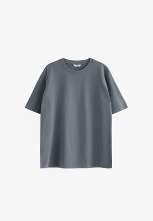 Skifergrå t-shirt med korte ærmer og rund halsudskæring med en løs pasform, vist mod en hvid baggrund.