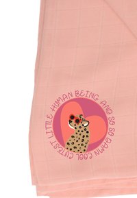 Light pink textured towel featuring a round graphic of a leopard with red sunglasses, encircled by a playful text design.