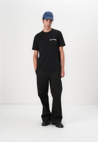Tommy Hilfiger - T-shirt z nadrukiem