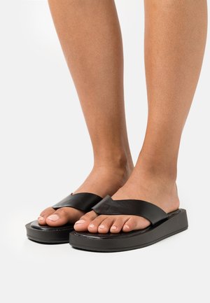DORNEA - T-bar sandals - black