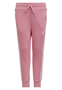 Pantaloni sportivi rosa realizzati in misto cotone, con strisce laterali bianche, vita elastica con cordino e polsini a costine. Logo Adidas sulla gamba.