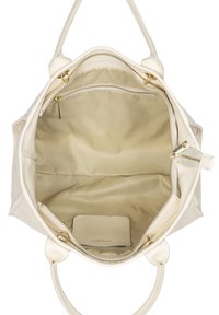 Jasno beżowa skórzana torebka z podwójnymi uchwytami, złotymi akcentami i przestronnym wnętrzem wyłożonym tkaniną, zawierającym kieszenie na zamek.