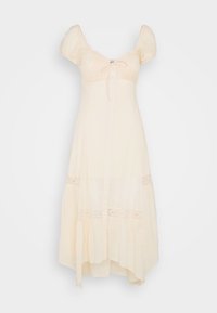 Cream-colored midi dress with puff sleeves, front buttons, lace details, a tied neckline, and a slightly ruffled hem.