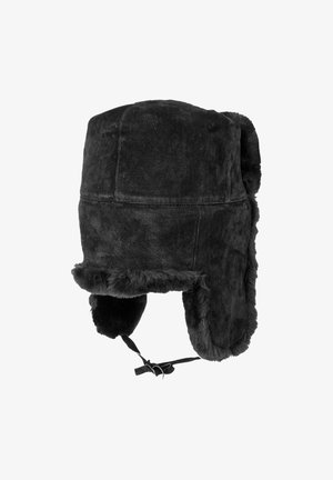 Black shearling trapper hat with ear flaps and chin straps, lined with soft fur for warmth and cold weather protection.