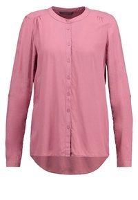 Chemise rose à manches longues avec des boutons, col arrondi, texture douce et coutures froncées aux épaules. Présente un ourlet arrondi.