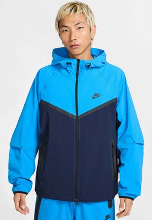 Lichte jas - obsidian light photo blue